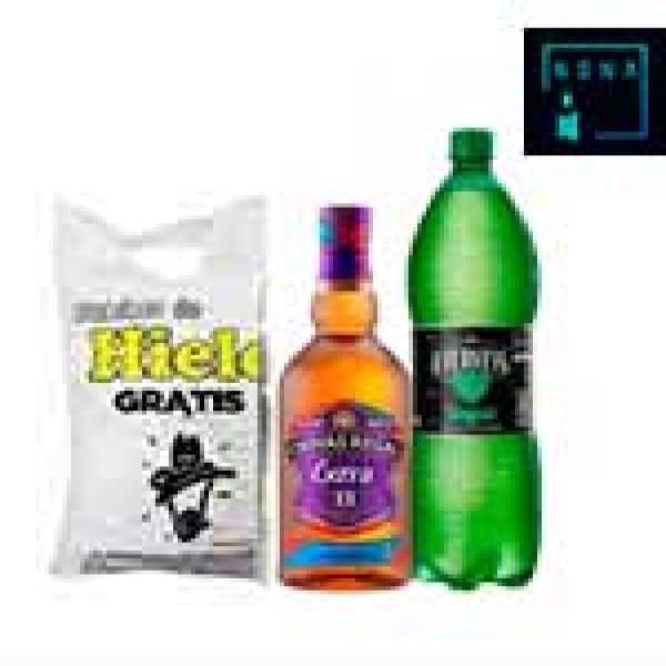 Whisky chivas 13 bourbon +gingerel + hielo